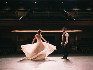 Bride dancing on stage